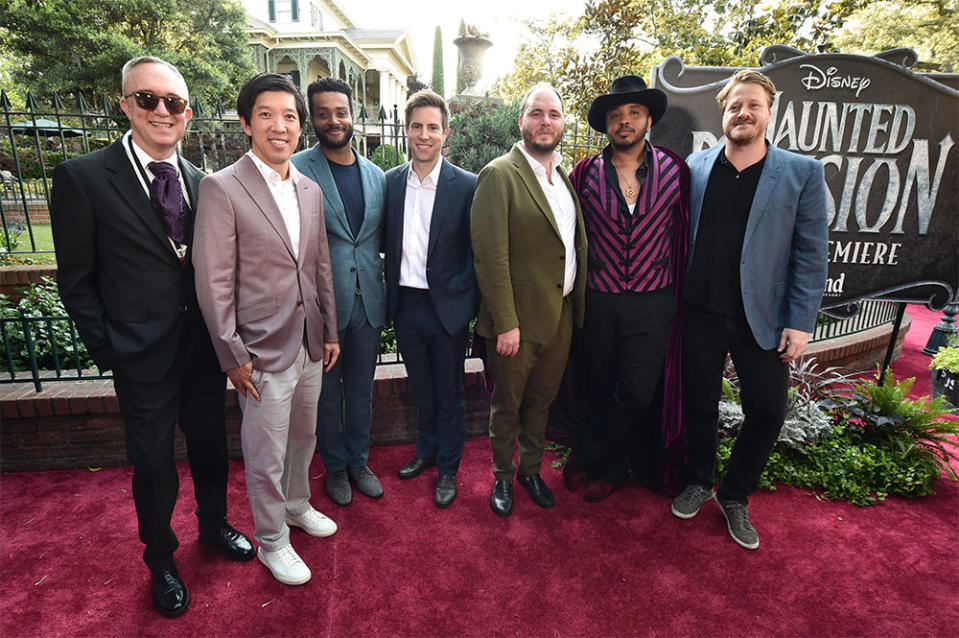 Phillip J. Bartell, Dan Lin, Kris Bowers, Jonathan Eirich, Nick Reynolds, Justin Simien and Jeffrey Waldron attend the celebration for Disney's live-action feature "Haunted Mansion" at Disneyland on July 15, 2023 in Anaheim, California.