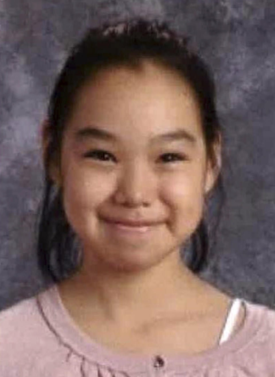 FILE - This undated file photo that is part of a missing person poster released by Alaska State Troopers shows Ashley Johnson-Barr. Authorities in Alaska say a 10-year-old girl has been found dead Friday, Sept. 14, 2018 more than a week after she was reported missing in a remote Inupiat Eskimo town on Alaska's northwestern coast. Alaska State Troopers said Friday that Ashley Johnson-Barr's remains were found east of Kotzebue. (Alaska State Troopers via AP, File)