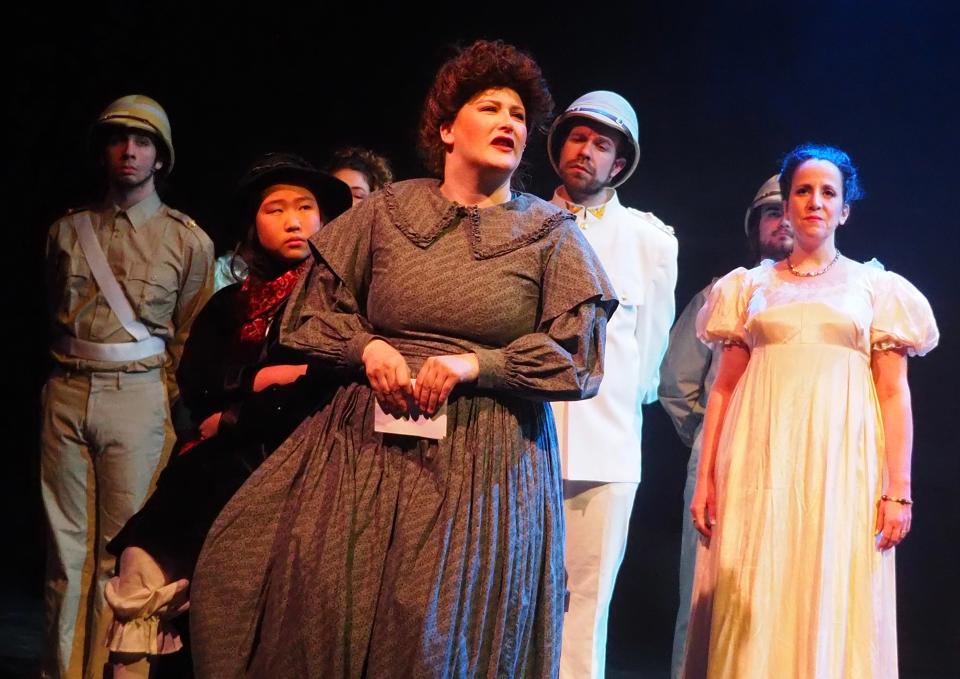 Christie Reading, of Pembroke, with the ensemble, in a scene from "The Secret Garden," presented by The Company Theatre from March 17 to April 2, 2023.