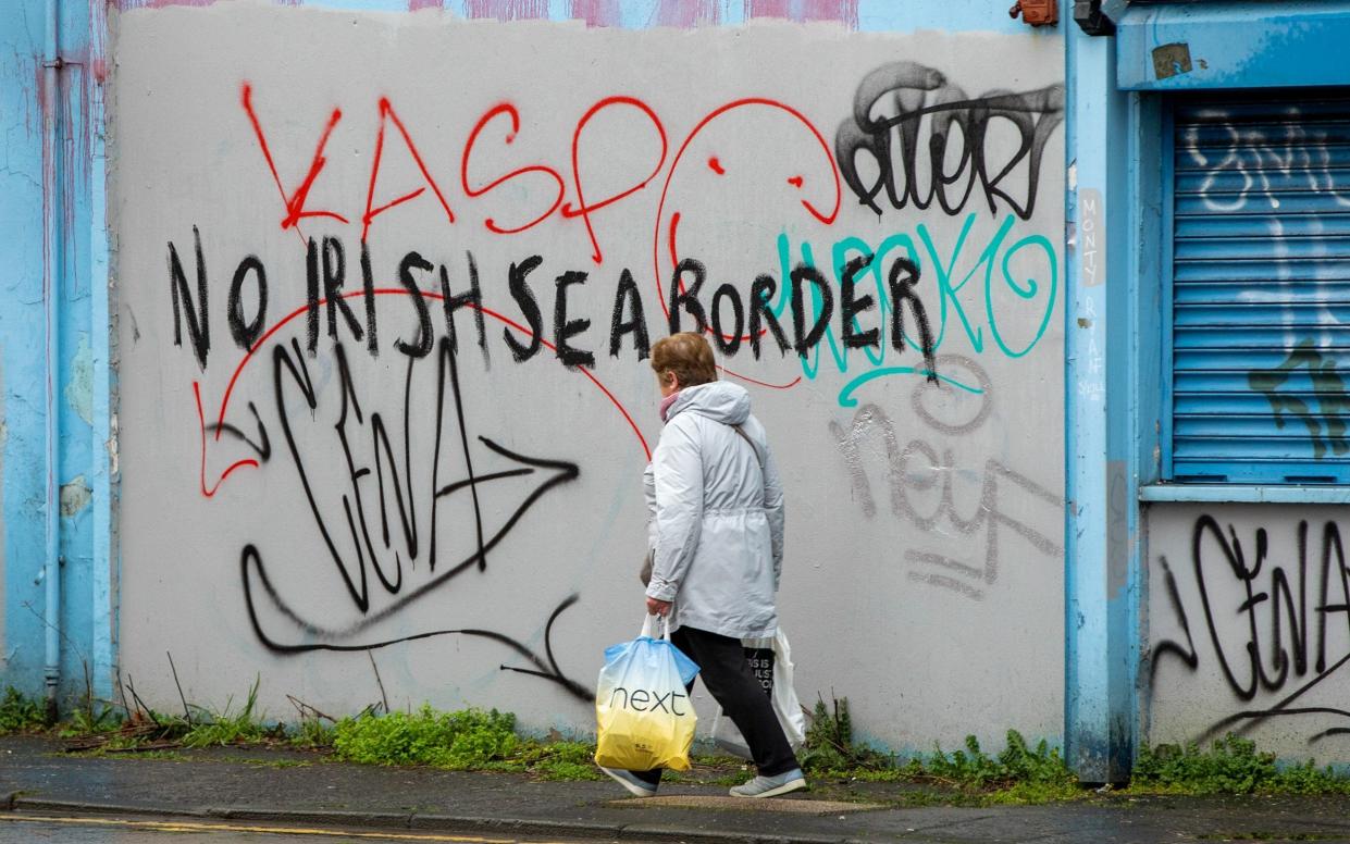 Graffiti on a building in the Sandy Row area of Belfast - Paul Faith/Bloomberg