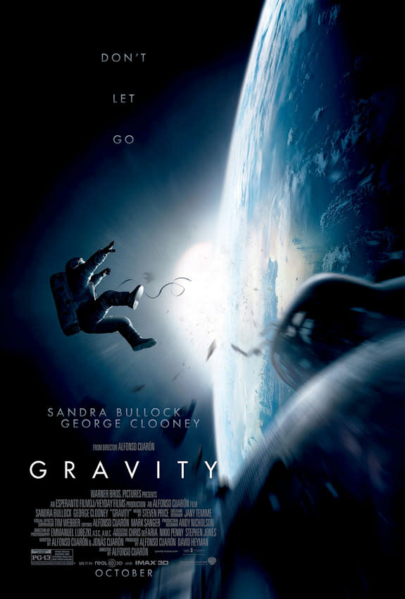 First official movie poster for director Alfonso Cuarón's "Gravity" starring George Clooney and Sandra Bullock.