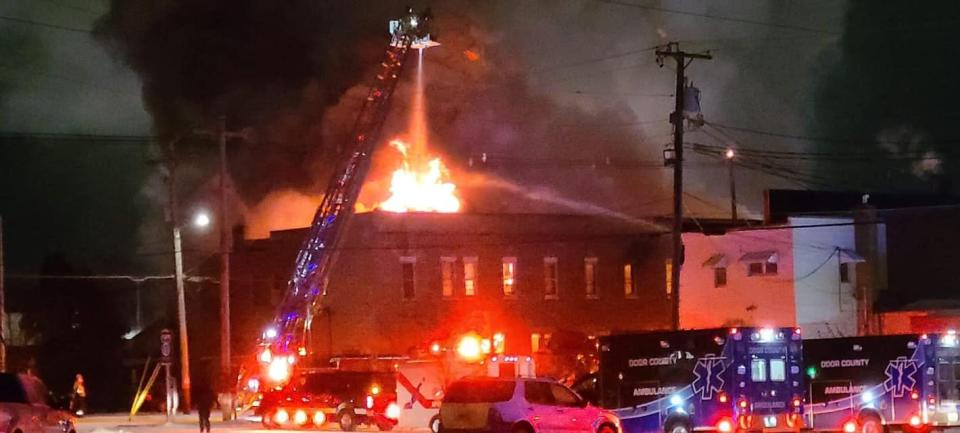 Firefighters battle an early morning blaze on Feb. 22 at Butch's Bar in downtown Sturgeon Bay. The building also housed nine occupied apartments. Two tenants died in the fire and another was hospitalized. Another resident of the apartments has been charged with eight counts related to the fire, including two for second-degree reckless homicide.