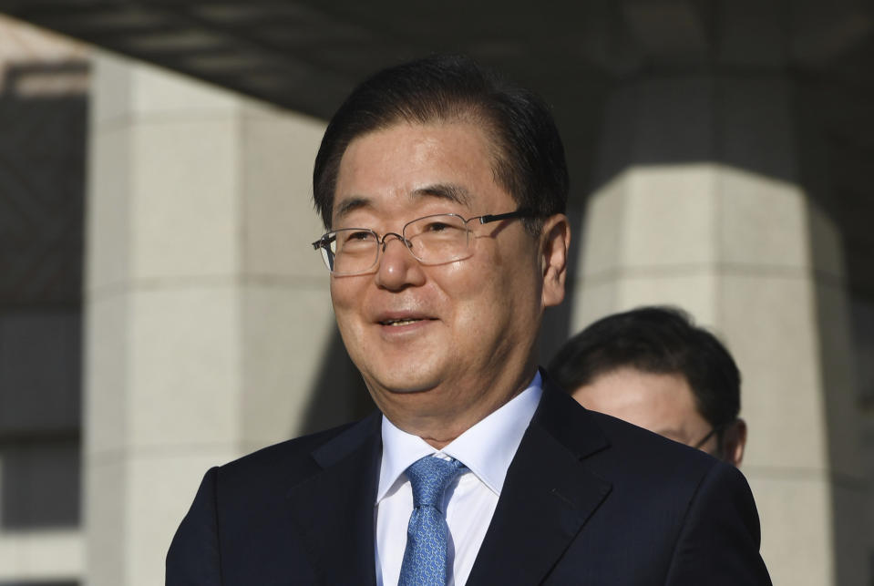 Chung Eui-yong, head of the presidential National Security Office, walks to board an aircraft as he and others in a delegation leave for Pyongyang, North Korea, at a military airport in Seongnam, south of Seoul, South Korea, Wednesday, Sept. 5, 2018. The high-level South Korean delegation left for North Korea to discuss arrangements for an inter-Korean summit there this month, as relations grow cooler between Washington and Pyongyang. (Jung Yeon-je/Pool Photo via AP)