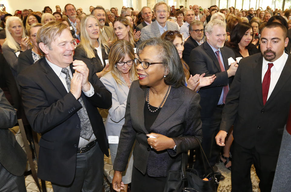 Anita Hill arrives before speaking at the University of Utah Wednesday, Sept. 26, 2018, in Salt Lake City. Hill has been back in the spotlight since Christine Blasey Ford accused Supreme Court nominee Brett Kavanaugh of sexually assaulting her when the two were in high school. Hill's 1991 testimony against Clarence Thomas riveted the nation. Thomas was confirmed anyway, but the hearing ushered in a new awareness of sexual harassment. (AP Photo/Rick Bowmer)