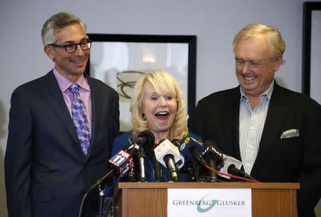 Shelly Sterling (C), her lawyer Pierce O'Donnell (R), and Steve Ballmer's lawyer Adam Streisand (2nd R) speak at a news conference to discuss the sale of the Los Angeles Clippers to Steve Ballmer in Los Angeles, California August 12, 2014. REUTERS/Lucy Nicholson