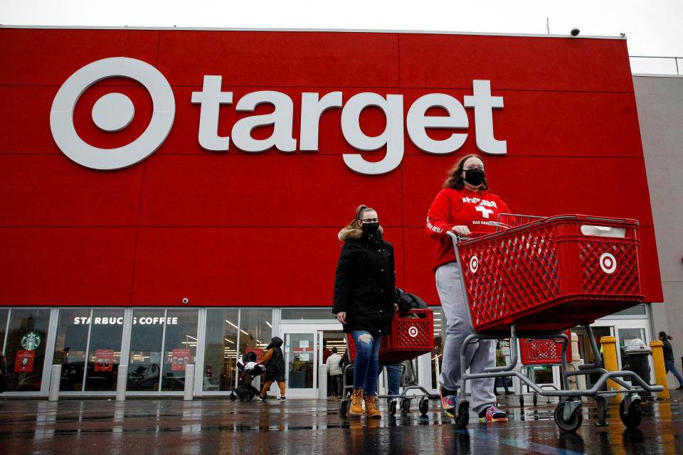 Shoppers exit a Target store during Black Friday sales in Brooklyn, New York, U.S., November 26, 2021.  REUTERS/Brendan McDermid