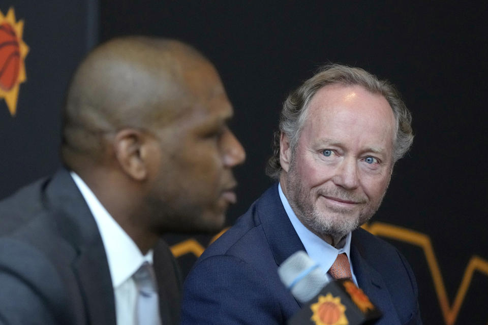 James Jones, left, Phoenix Suns president of basketball operations and general manager, introduces new Suns head coach Mike Budenholzer, right, during an NBA news conference Friday, May 17, 2024, in Phoenix. (AP Photo/Ross D. Franklin)