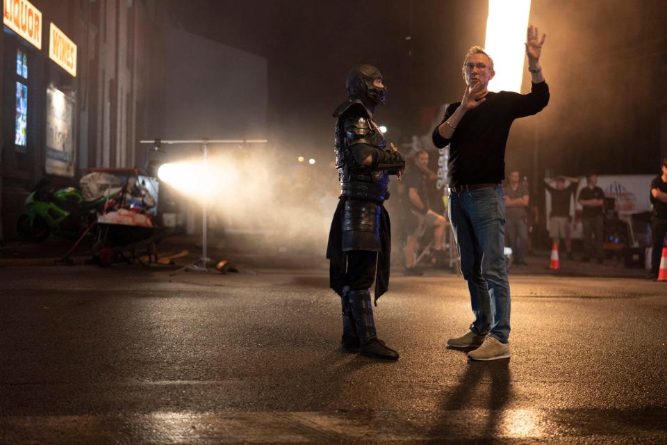 Sub-Zero (Joe Taslim) and director Simon McQuoid on the set of "Mortal Kombat." McQuoid had to ask his star to slow down his moves for the camera. "He just gets on set and he just becomes this beast," McQuoid says.