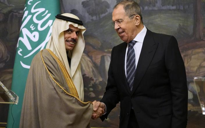 Saudi Arabia's Foreign Minister Prince Faisal bin Farhan Al-Saud (L) and Russian Foreign Minister Sergey Lavrov shake hands during a joint news conference after their talks in Moscow, Russia - ALEXANDER ZEMLIANICHENKO/POOL/EPA-EFE/Shutterstock