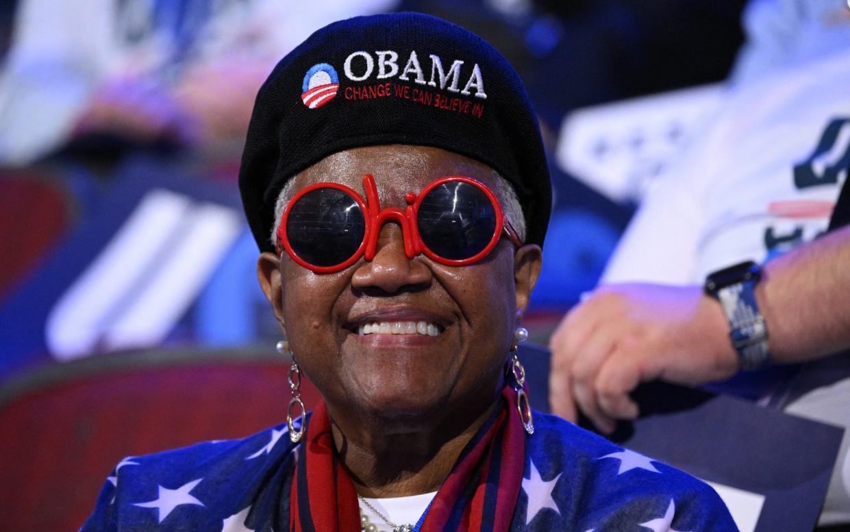 A delegate wearing an "Obama" hat attends the second day of the Democratic National Convention