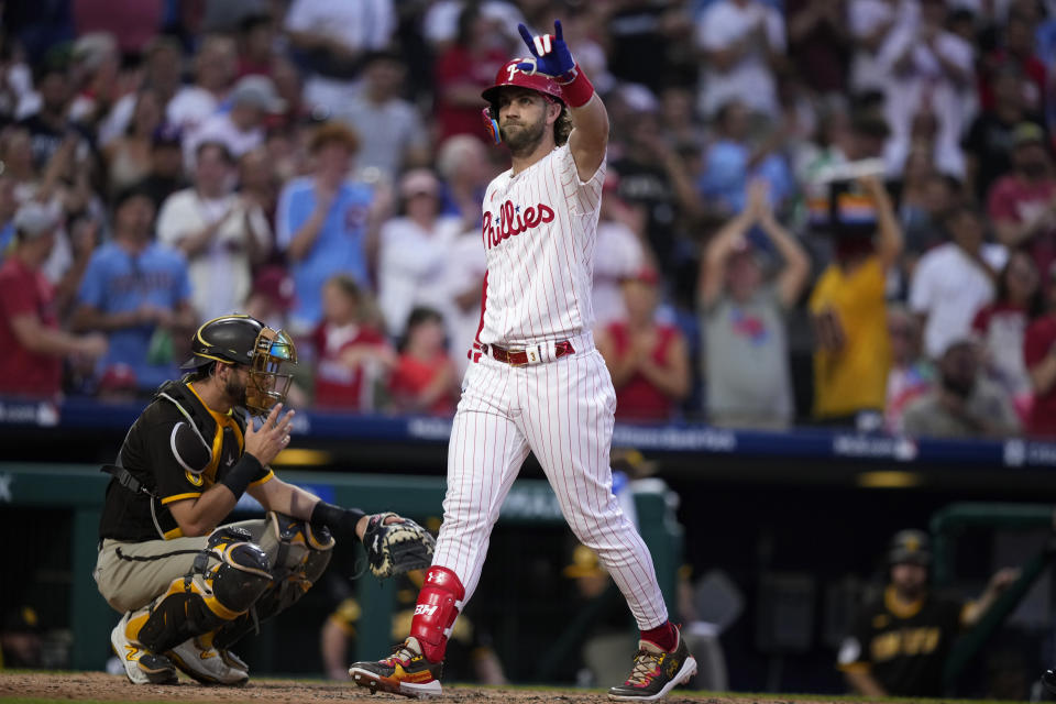 Philadelphia Phillies' Bryce Harper reacts after hitting a home run against San Diego Padres' Ryan Weathers during the fourth inning of the second baseball game in a doubleheader, Saturday, July 15, 2023, in Philadelphia. (AP Photo/Matt Slocum)