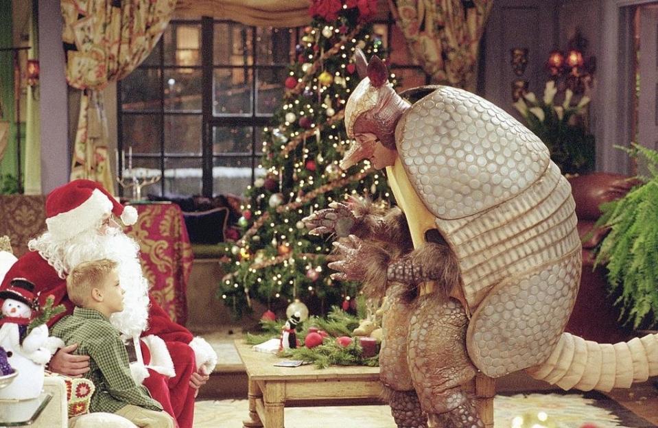 Cole Mitchell Sprouse as Ben Geller, Matthew Perry as Chandler Bing as "Santa Claus", David Schwimmer as Ross Geller as "The Holiday Armadillo