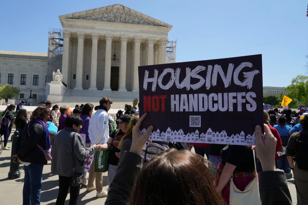 Demonstrators gather in April outside the Supreme Court, which heard arguments in The City of Grants Pass v. Johnson.