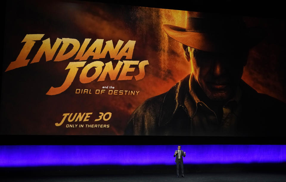 Tony Chambers, the head of theatrical distribution for Disney Entertainment, discusses the upcoming film "Indiana Jones and the Dial of Destiny" during the Walt Disney Studios presentation at CinemaCon 2023, the official convention of the National Association of Theatre Owners (NATO) at Caesars Palace, Wednesday, April 26, 2023, in Las Vegas. (AP Photo/Chris Pizzello)
