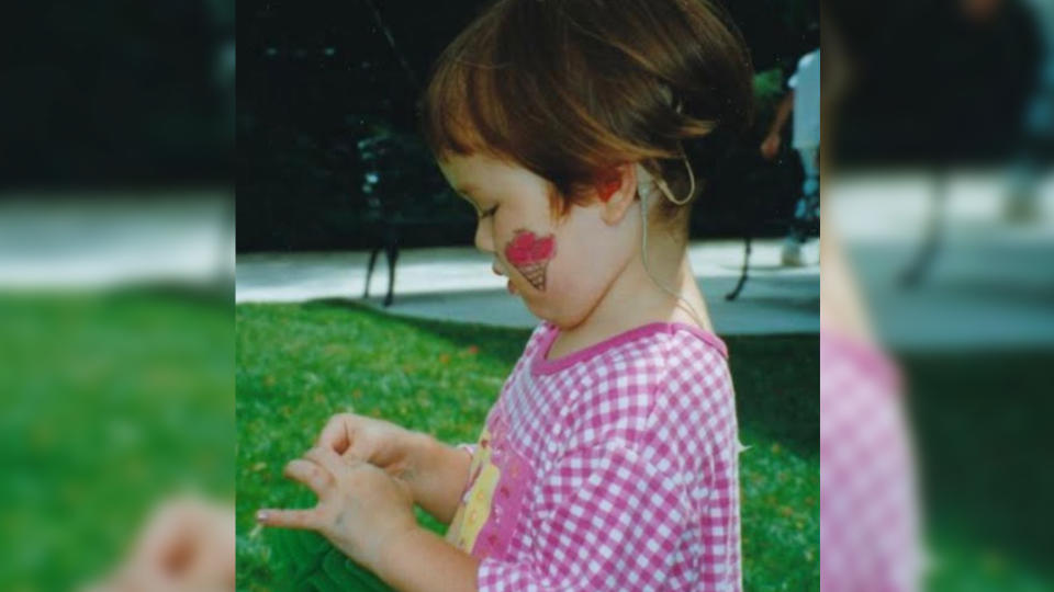 Heringer as a young girl with her cochlear implant. (Photo: Abigail Heringer via Instagram @abigail_heringer)