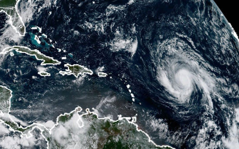 This image obatined from the National Oceanic and Atmospheric Administration shows Huricane Irma on Sunday - Credit: AFP