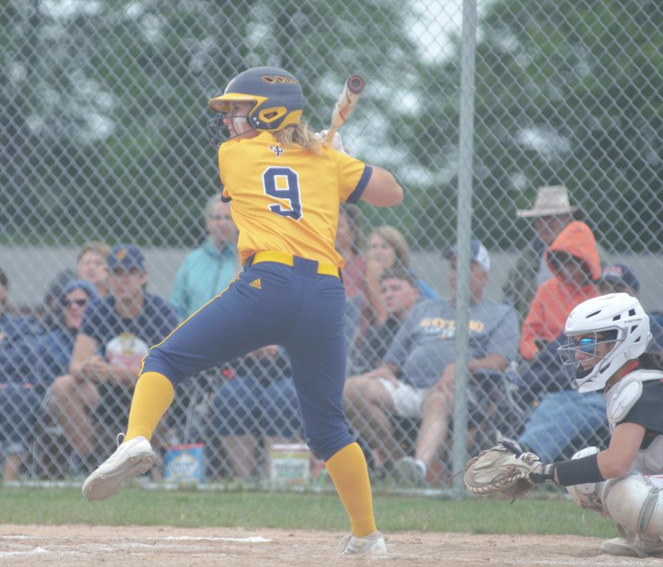 Alexis Shepherd starts her swing during an MHSAA Regional Final matchup with Escanaba last year.