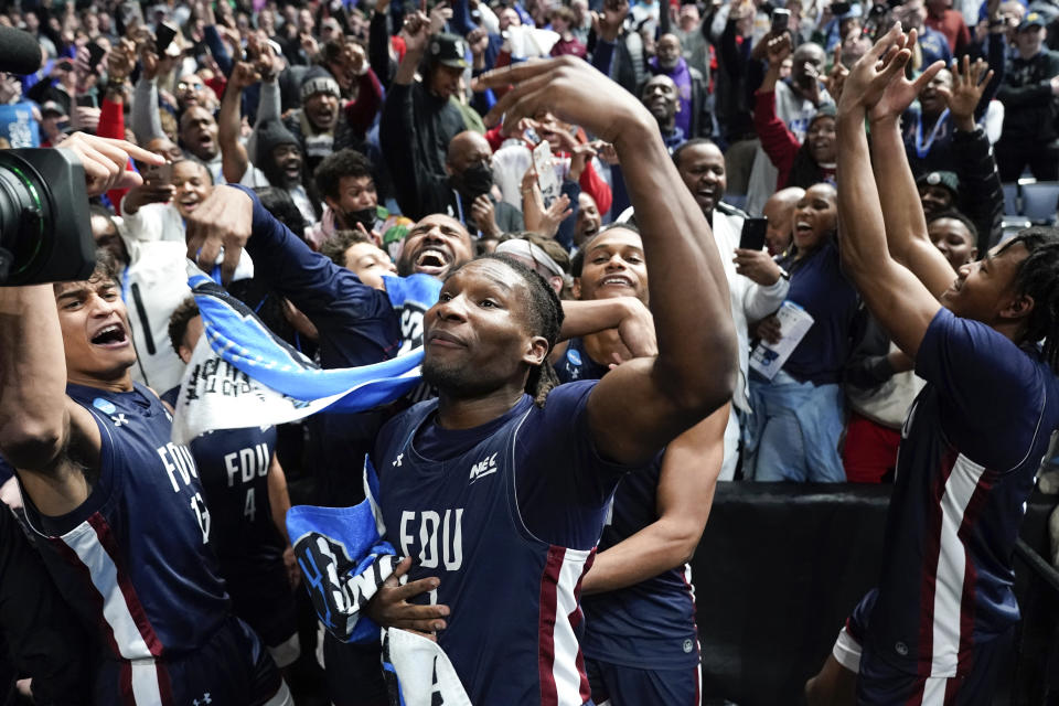 Fairleigh Dickinson players celebrate beating Purdue 63-58 after a first-round college basketball game in the NCAA Tournament Friday, March 17, 2023, in Columbus, Ohio. (AP Photo/Paul Sancya)