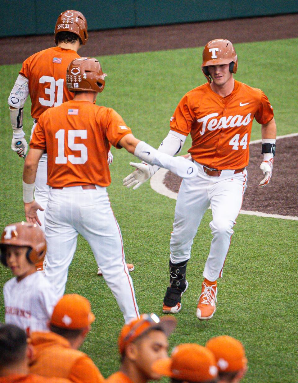Texas outfielder Max Belyeu celebrates with teammates after hitting a two-run home run in the first inning of the Longhorns' 11-0 win over UT-Arlington at UFCU Disch-Falk Field on Tuesday.