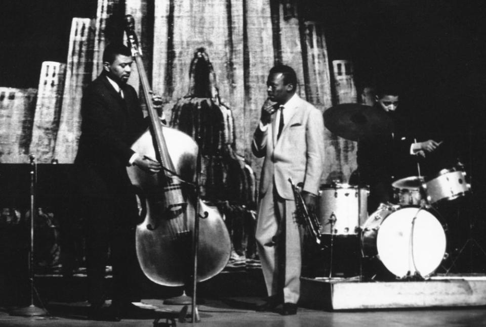 Miles Davis on stage with Cobb and the bass player Paul Chambers at the Apollo Theater in 1960.