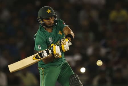 Cricket - New Zealand v Pakistan - World Twenty20 cricket tournament - Mohali, India, 22/03/2016. Pakistan's captain Shahid Afridi plays a shot. REUTERS/Adnan Abidi