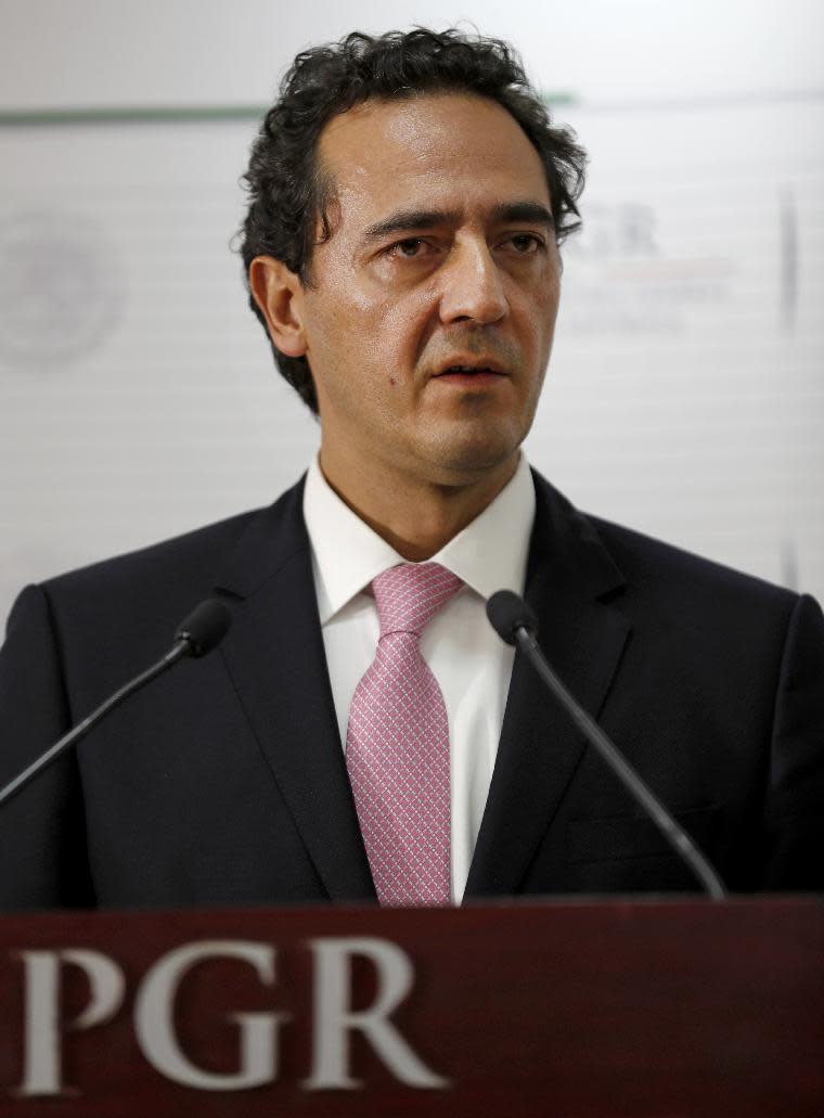 Deputy Attorney General Alberto Elias Beltran speaks to the press about the extradition of drug lord Joaquin "El Chapo" Guzman to the U.S. in Mexico City, Thursday, Jan. 19, 2017. Guzman, who twice escaped from maximum-security prisons in his country, was extradited at the request of the United States to face drug trafficking and other charges and arrived in New York late Thursday. (AP Photo/Eduardo Verdugo)
