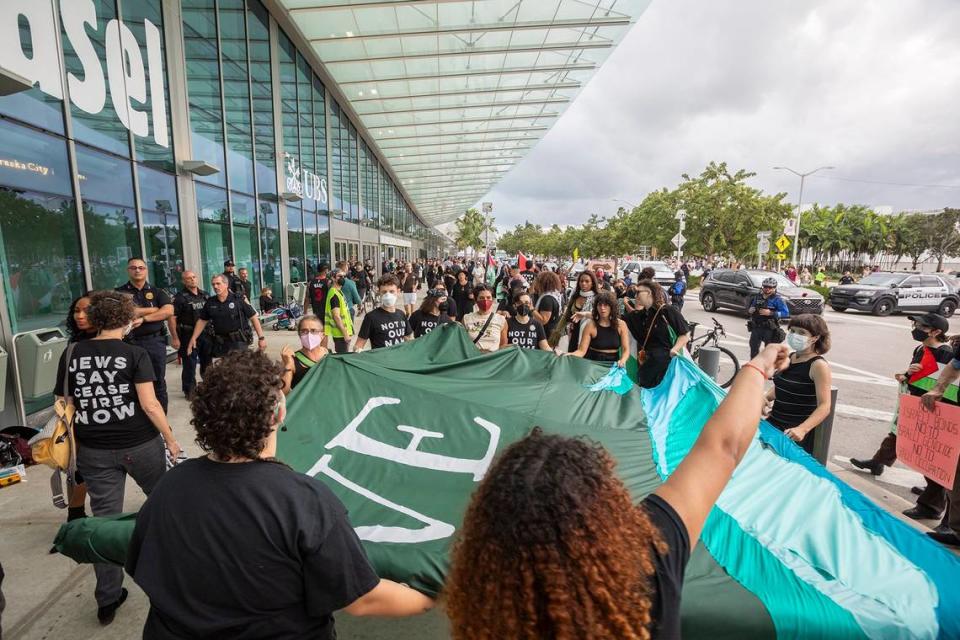 Pro-Palestinian protesters rallied outside of Art Basel at the Miami Beach Convention Center on Dec. 8, 2023.