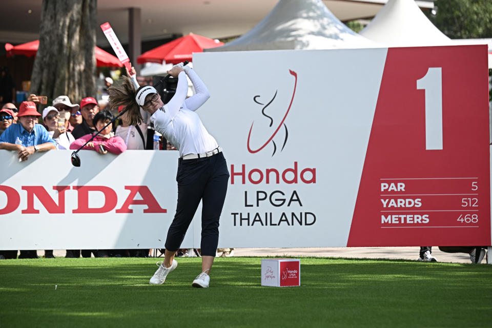 Brooke Henderson of Canada tees off during the first day of the 2024 Honda LPGA Thailand golf tournament at the Siam Country Club in Pattaya on February 22, 2024. (Photo by Lillian Suwanrumpha/AFP)