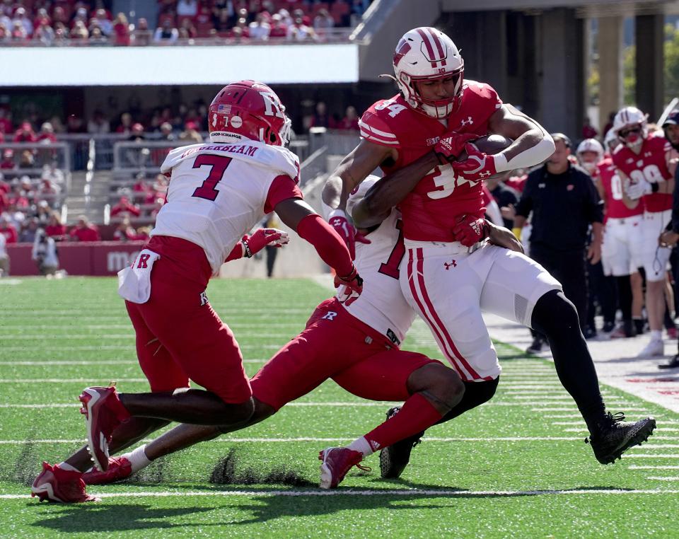 Wisconsin running back Jackson Acker posted 65 yards on 13 carries Saturday against Rutgers. He entered the game with 65 total rushing yards in his college career.