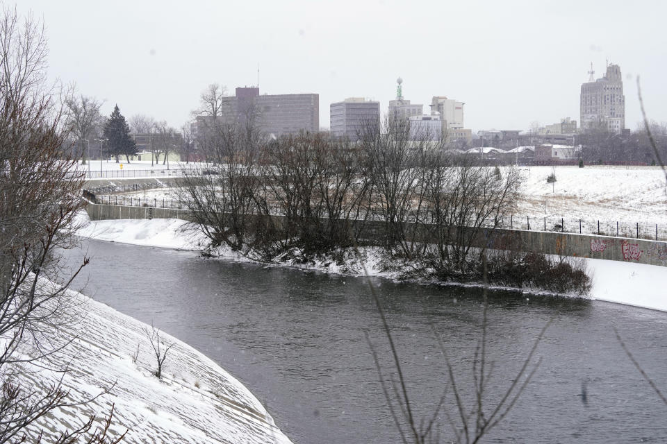 The Flint River flows, Thursday, Jan. 6, 2022, in Flint, Mich. After Flint's water crisis, 35% of Black adults in the U.S. said they didn't drink tap water, up from 25%. High-profile cases of lead contamination in predominantly Black cities and a history of deception around the problem have led to a distrust of tap water, which can have long-term health and financial consequences. (AP Photo/Carlos Osorio)