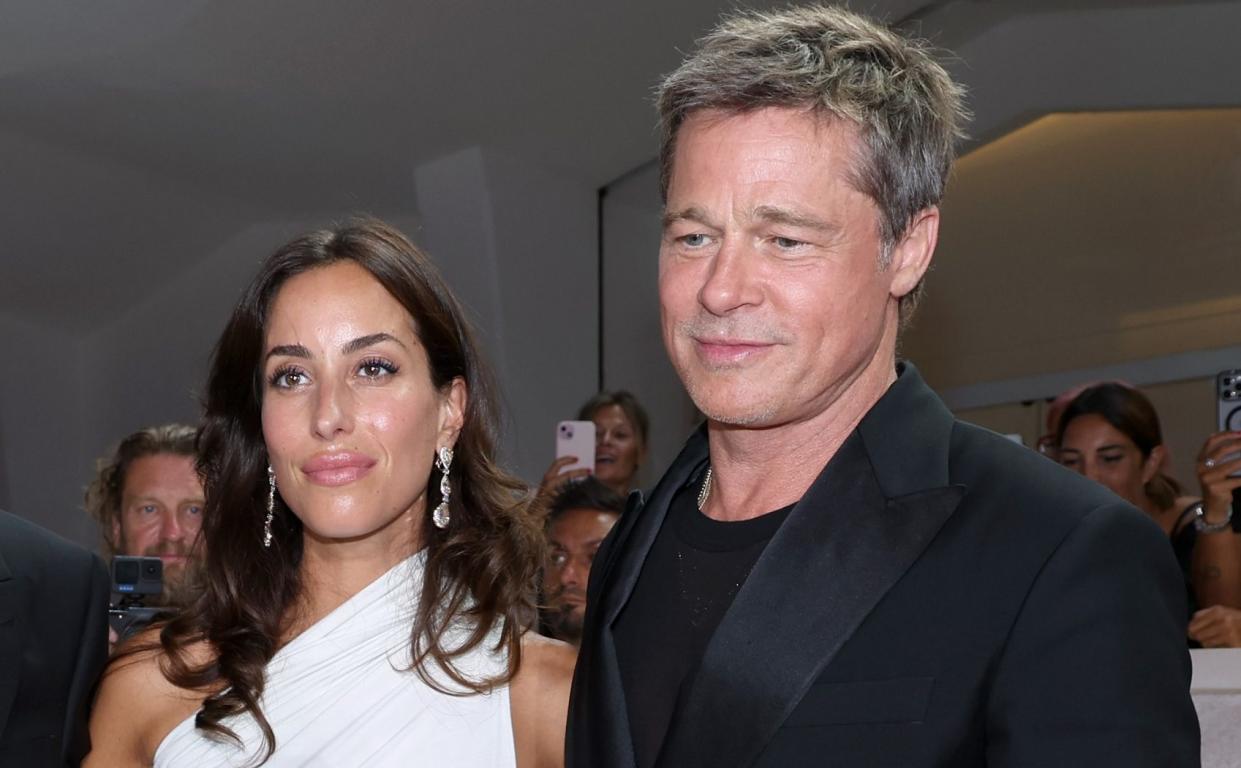 Ines de Ramon and Brad Pitt attend the "Wolfs" red carpet during the 81st Venice International Film Festival on September 01, 2024 in Venice, Italy