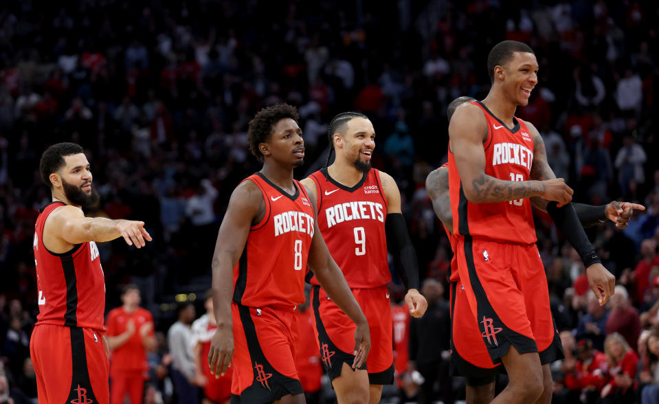 HOUSTON, TEXAS - NOVEMBER 12: The Houston Rockets celebrate in the second half against the Denver Nuggets at Toyota Center on November 12, 2023 in Houston, Texas.  NOTE TO USER: User expressly acknowledges and agrees that, by downloading and or using this photograph, User is consenting to the terms and conditions of the Getty Images License Agreement. (Photo by Tim Warner/Getty Images)