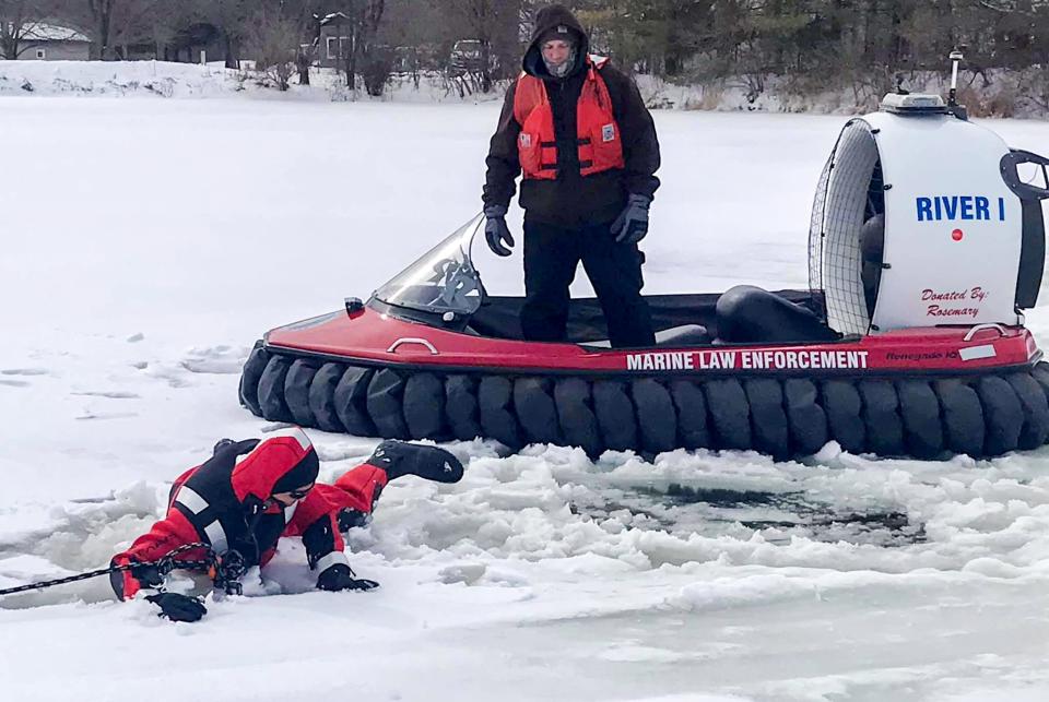 Officers use the Fon du Lac Park Police's hovercraft River 1 in a training exercise in icy conditions.