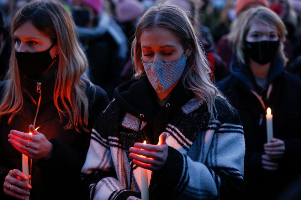 LONDON, UNITED KINGDOM - MARCH 13: Mourners for the life of murdered 33-year-old Sarah Everard, whose remains were found this week in woodland in Kent, take part in an officially cancelled 'Reclaim These Streets' vigil on Clapham Common in London, United Kingdom on March 13, 2021. Wayne Couzens, a serving Metropolitan Police officer, was yesterday charged with the kidnap and murder of Everard, who went missing over a week ago from south London and whose disappearance and death has seen women across the country speaking up about their own fears of not being safe on the streets. (Photo by David Cliff/Anadolu Agency via Getty Images)