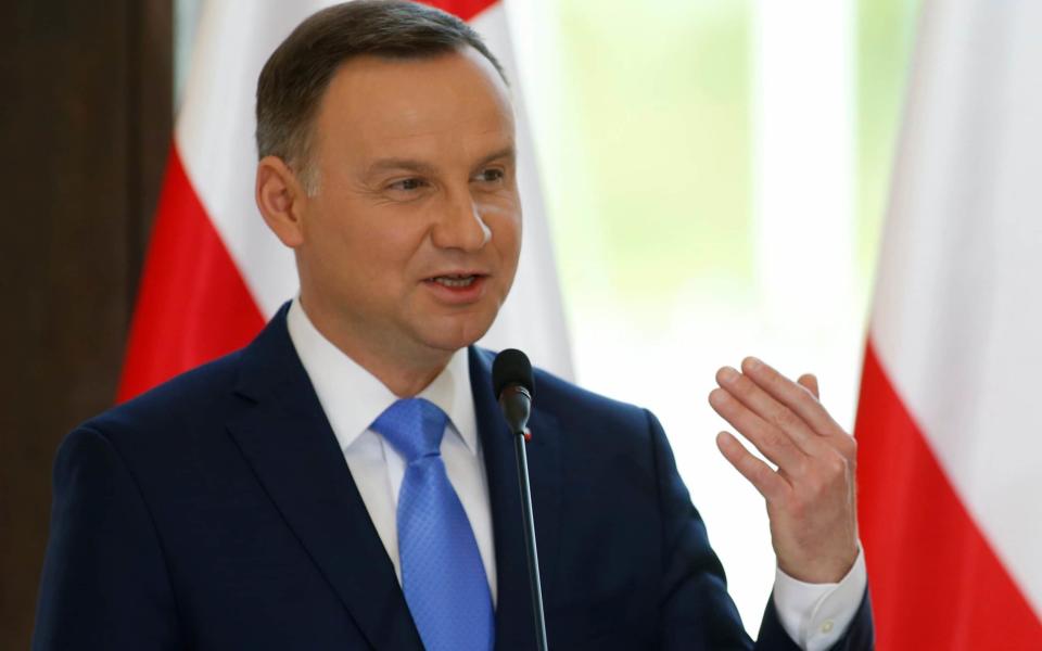 Polish president Andrzej Duda signed the controversial law on Friday - Credit: DAVID MDZINARISHVILI/Reuters