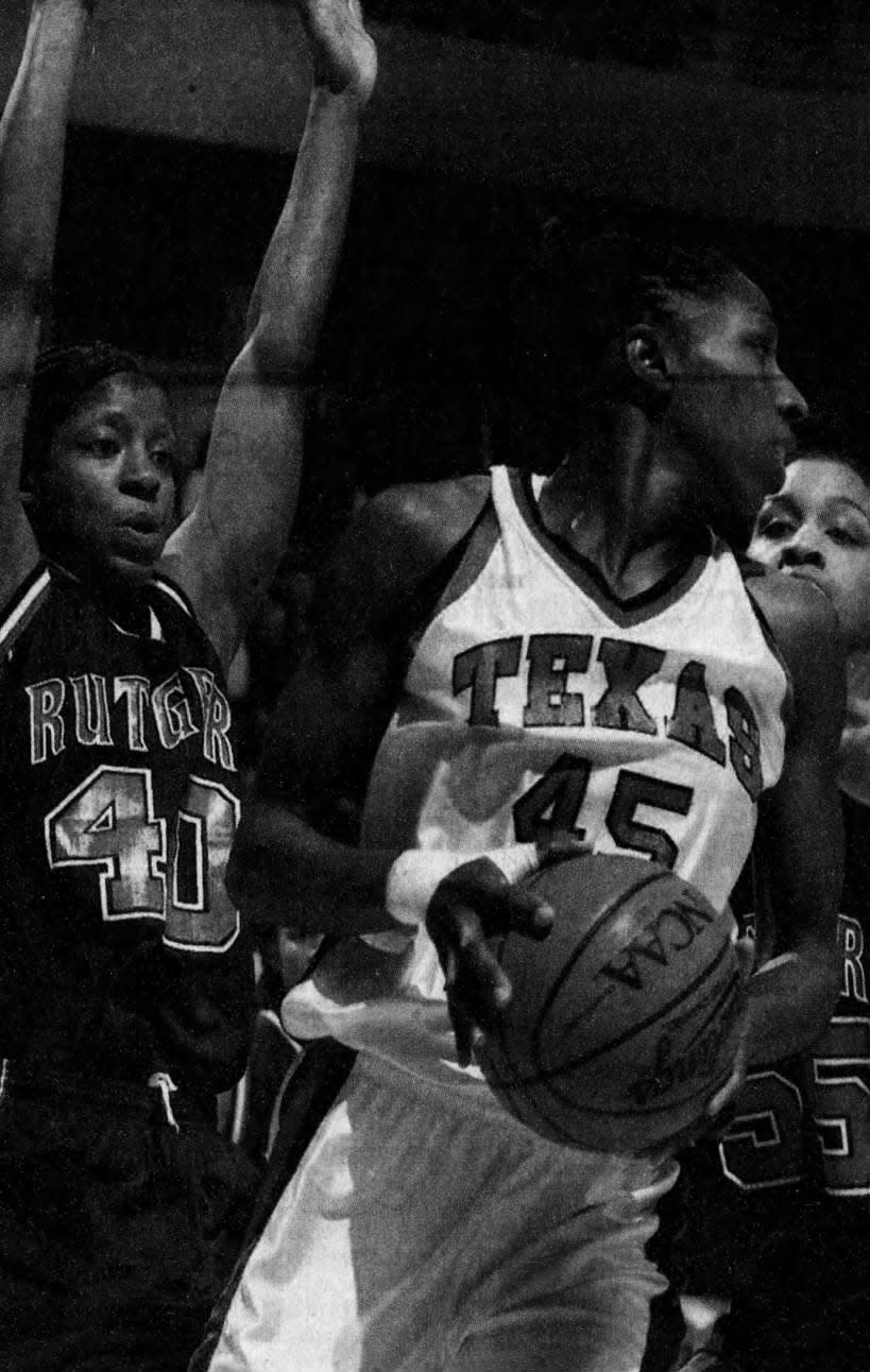 Rutgers University’s Linda Miles (40) and Tammy Sutton-Brown guard Texas Tech’s Angie Braziel.