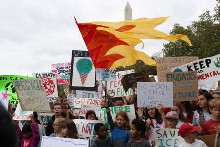 Environmental advocates rally near the White House in Washington