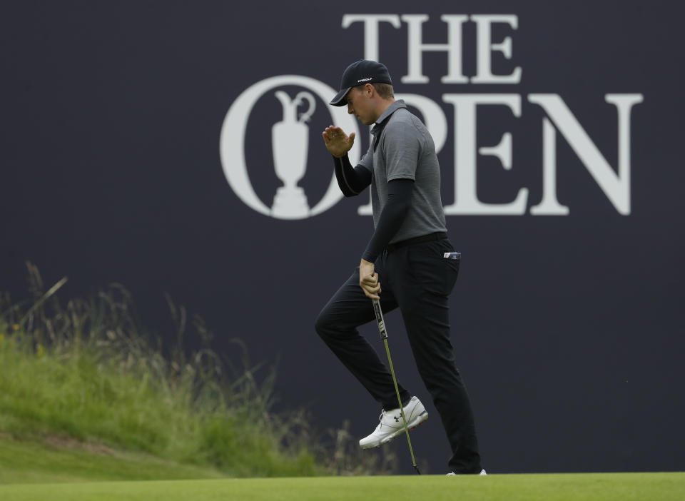 Jordan Spieth of the United States reacts after putting on the18th green during the second round of the British Open Golf Championships at Royal Portrush in Northern Ireland, Friday, July 19, 2019.(AP Photo/Matt Dunham)