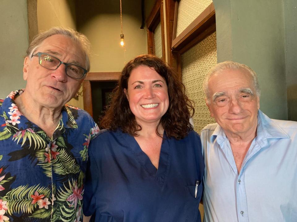 Oklahoma-based forensic pathologist Cheryl Niblo, center, poses for a photo with actor Robert De Niro, left, and director Martin Scorsese behind the scenes on the movie "Killers of the Flower Moon," which filmed in Oklahoma in 2021. Niblo worked as a consultant on the film.