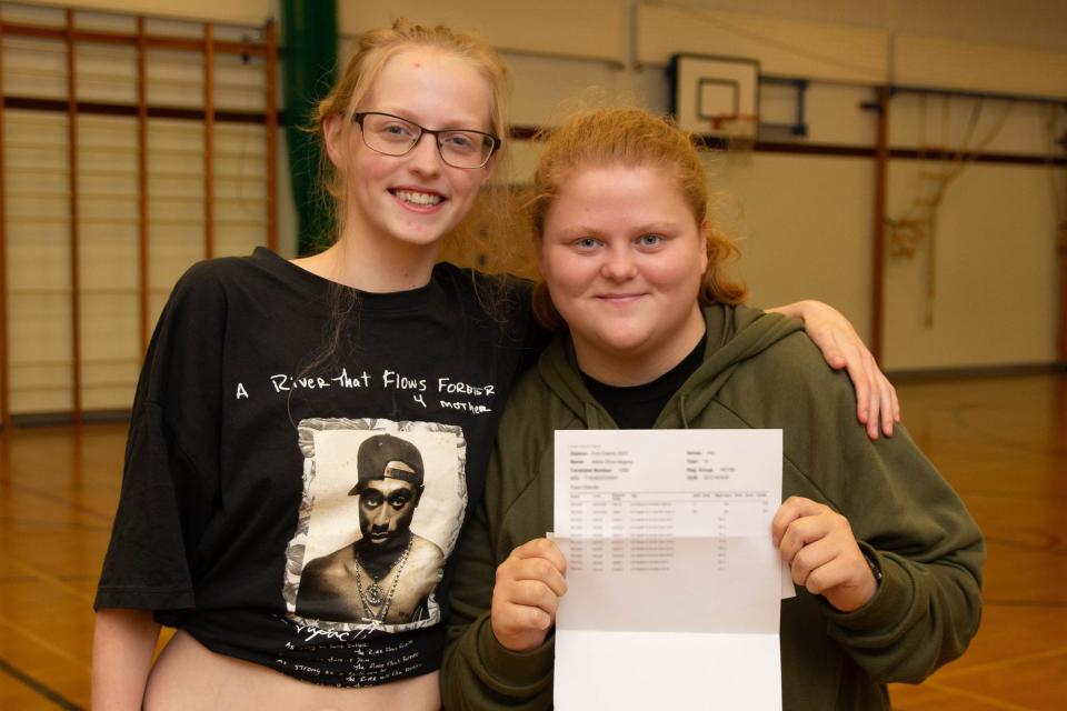Abbie Hegarty (right) happy with her results.