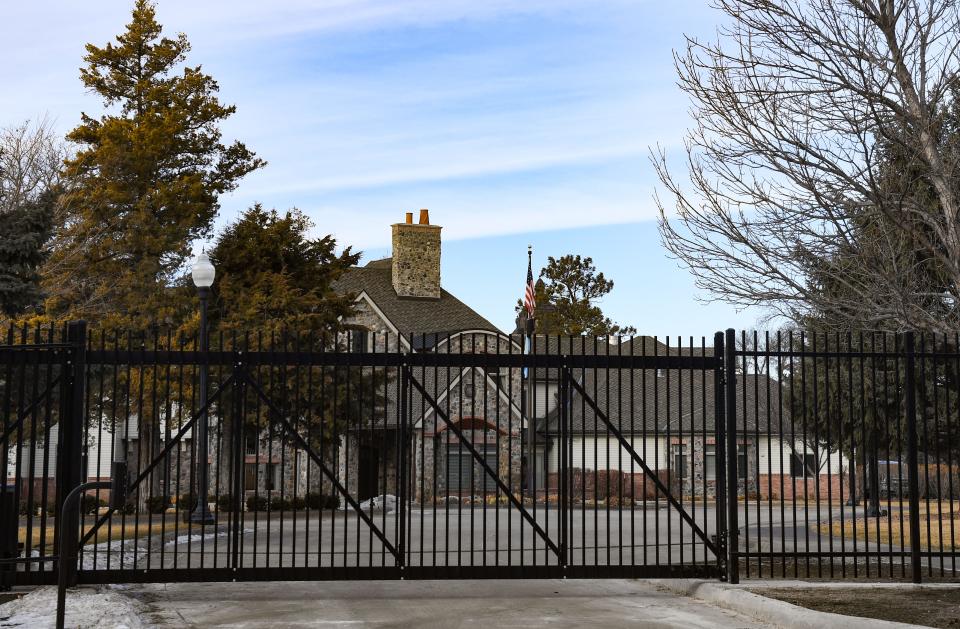 A newly erected fence stands around the perimeter of the South Dakota Governor's mansion on Monday, January 11, in Pierre.