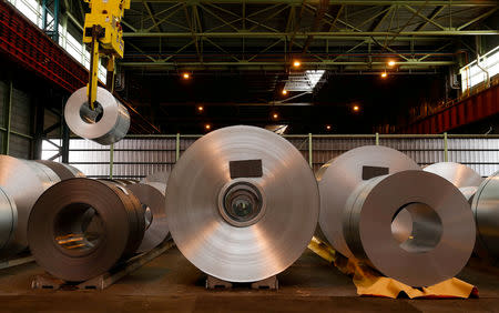 FILE PHOTO: Metal coils are seen at ArcelorMittal steel plant in Ghent, Belgium, May 22, 2018. REUTERS/Yves Herman/File Photo