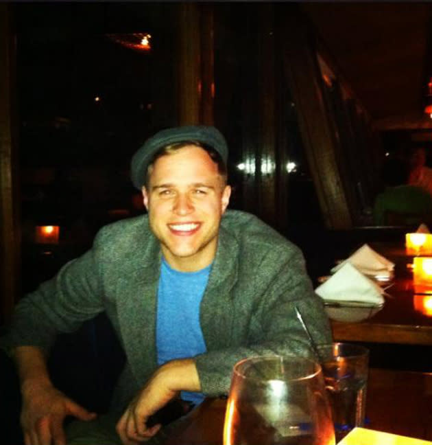 Celebrity photos: Olly Murs has been hanging out in America, writing for his new album before heading on tour with One Direction. He tweeted this picture of him enjoying some downtime at a restaurant, along with the caption: “Chilling in Malibu!! It's lush here just had a gorge fish meal!!!” [sic]