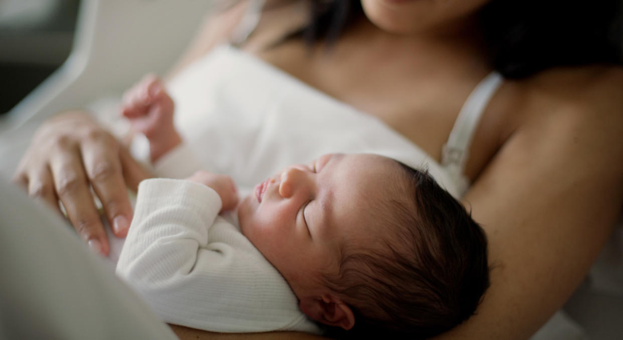 A woman questions protocol after her Mother-in-law is insistent on being there at grandchild’s birth. [Photo: Getty]