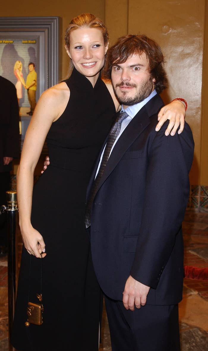 Closeup of Gwyneth Paltrow with her arm around Jack Black's shoulder