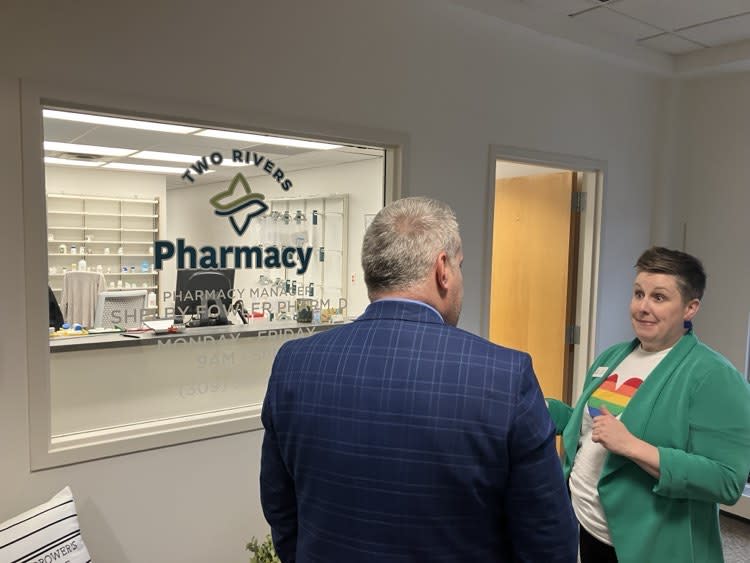 Wells talks to Sorensen about the Two Rivers Pharmacy inside TPQC.