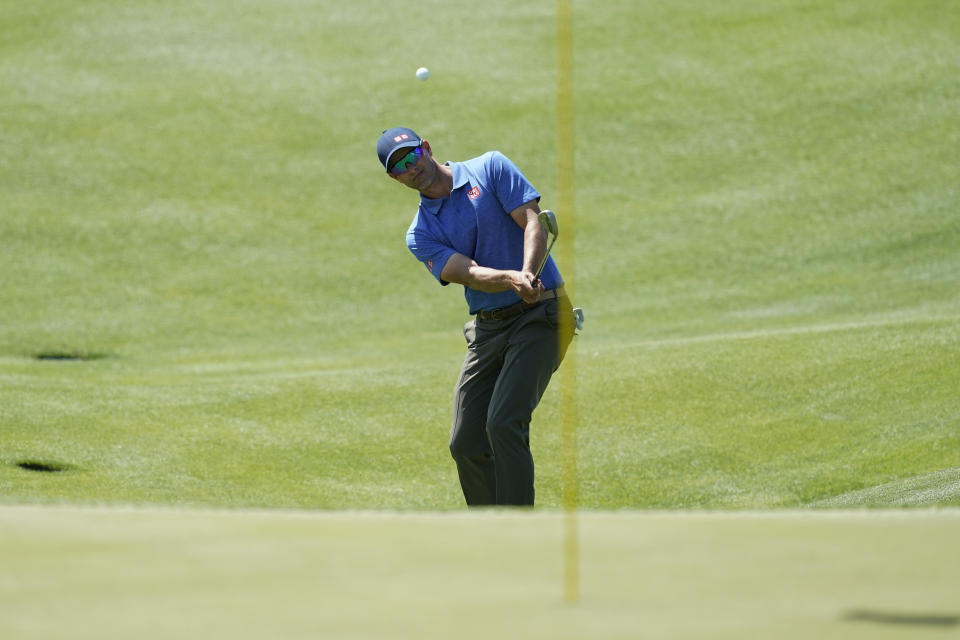 Adam Scott hits on to the fifth green during the third round of the Dell Technologies Match Play Championship golf tournament, Friday, March 25, 2022, in Austin, Texas. (AP Photo/Tony Gutierrez)