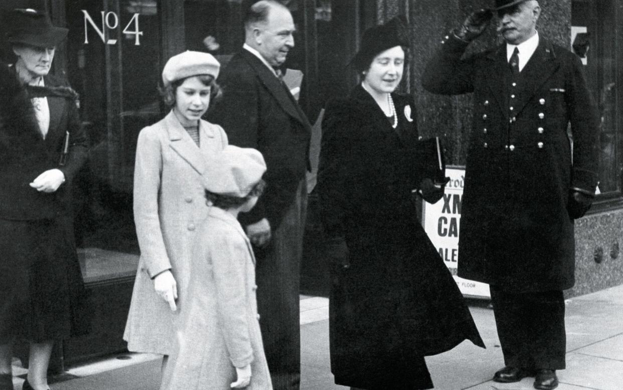 Queen Elizabeth, aged 12, leaves Harrods with her mother and sister, 1938 - Harrods