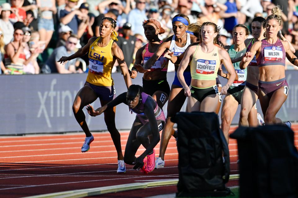 Olympic gold medalist Athing Mu falls on the first lap of the 800-meter final during the US Olympic Track and Field Team Trials.