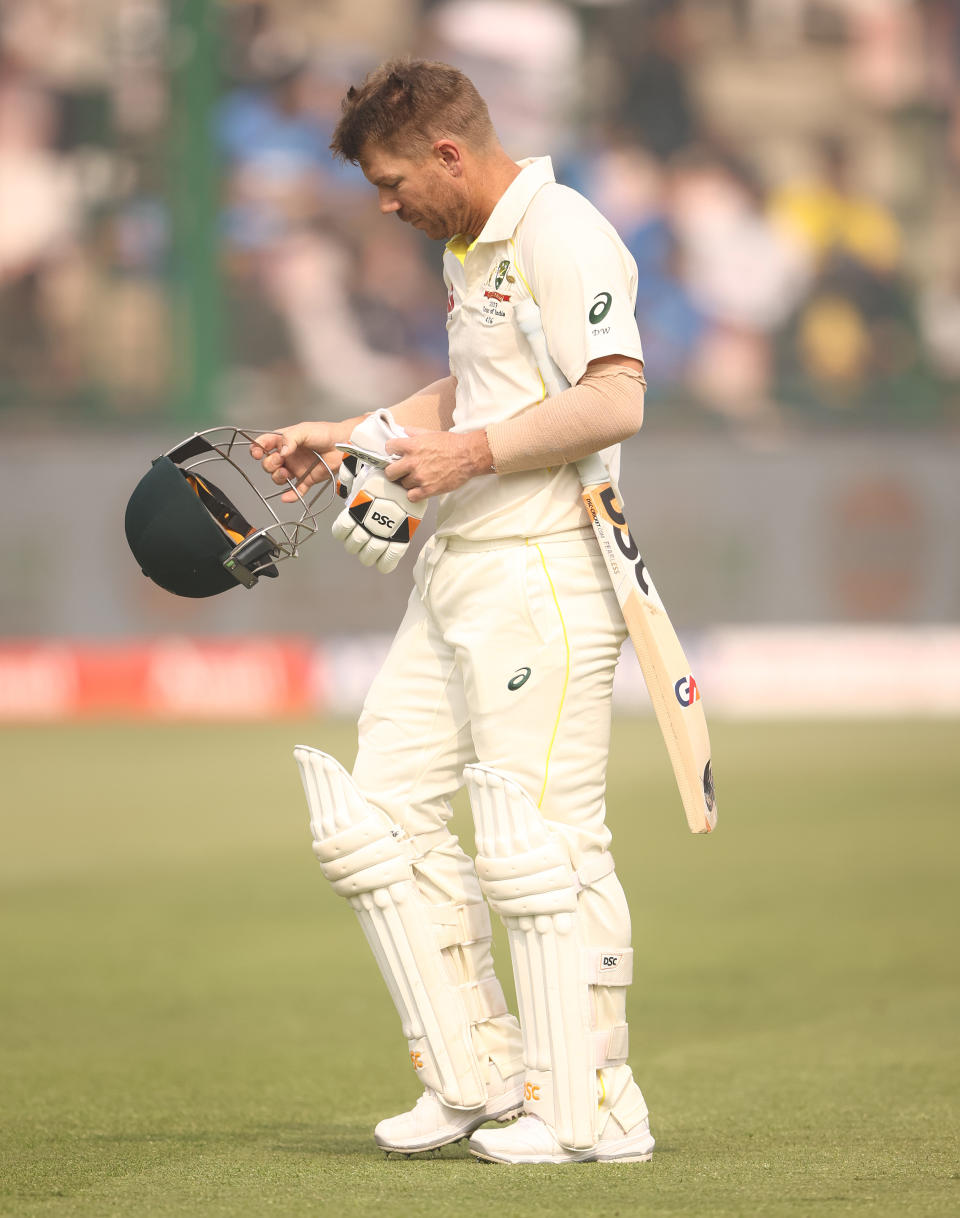 David Warner (pictured) walks off after he was dismissed.